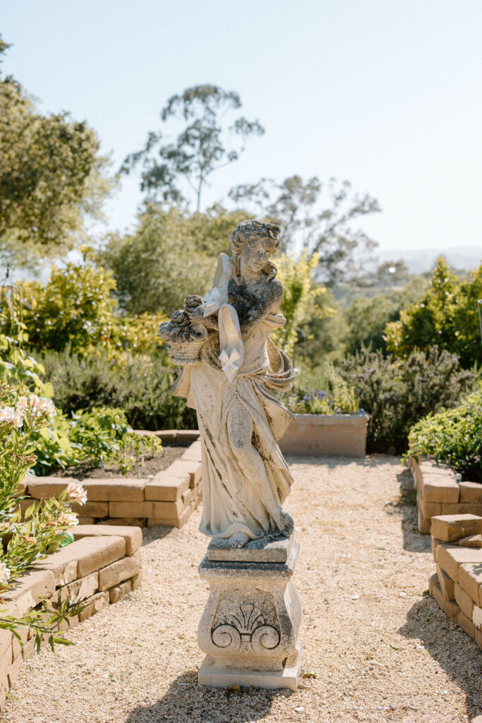 Casa Blanca Interlaken Wedding Venue in California | Prada Wedding heels on ancient Italian statue 