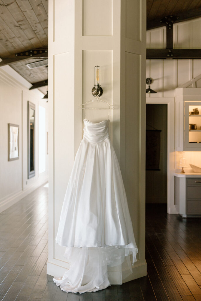 Wedding Dress hanging at The Ranch at Lone Oak Longhorns