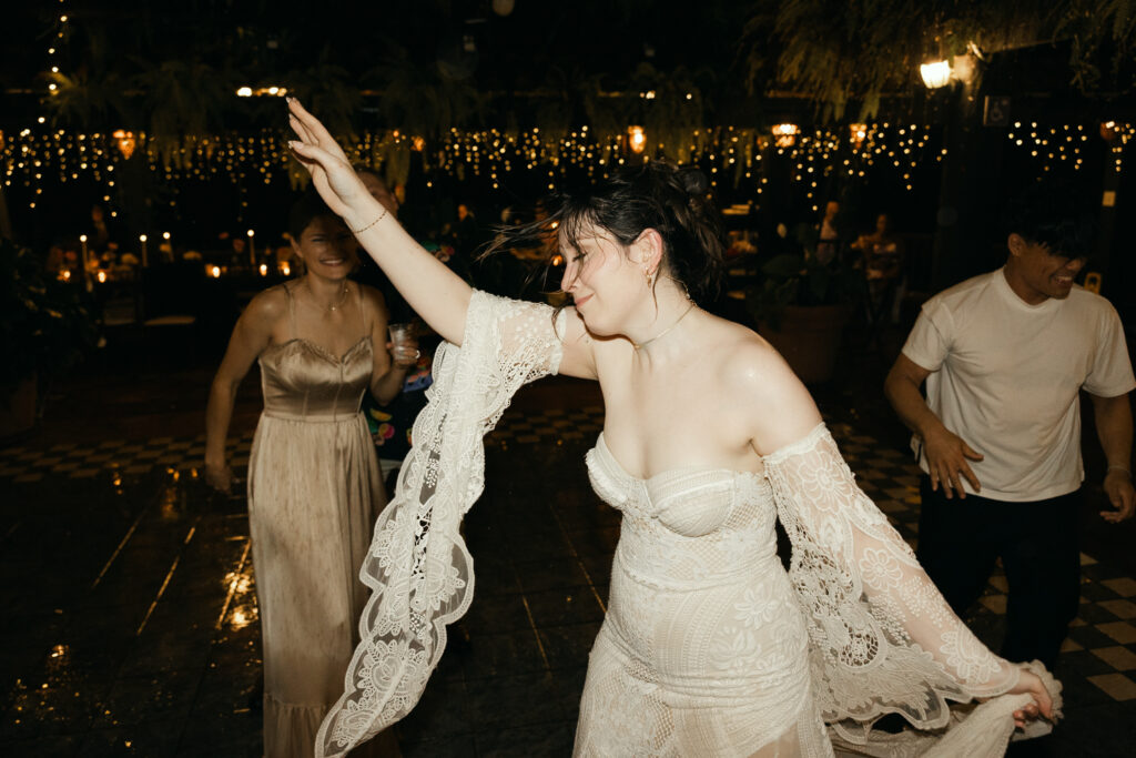Late night dancing in the warm tropical rain on their wedding day in puerto rico 