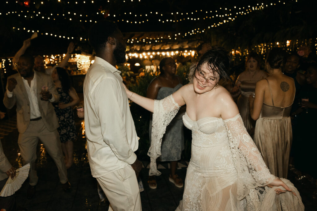 Late night dancing in the warm tropical rain on their wedding day in puerto rico 