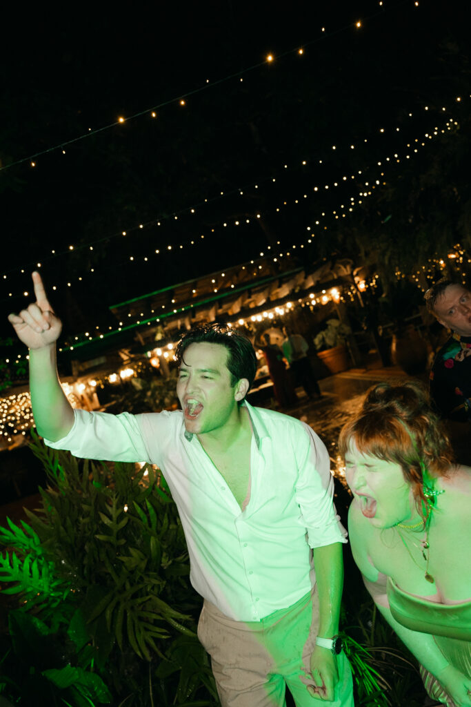 Late night dancing in the warm tropical rain on their wedding day in puerto rico 