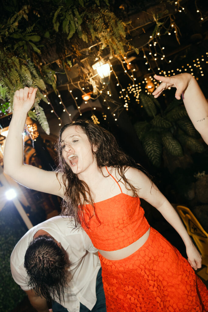 Late night dancing in the warm tropical rain on their wedding day in puerto rico 