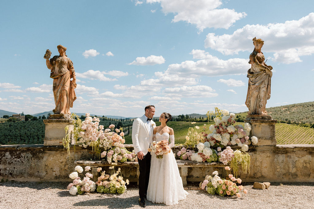 Wedding Couple with ceremony florals at Villa Corsini in Tuscany