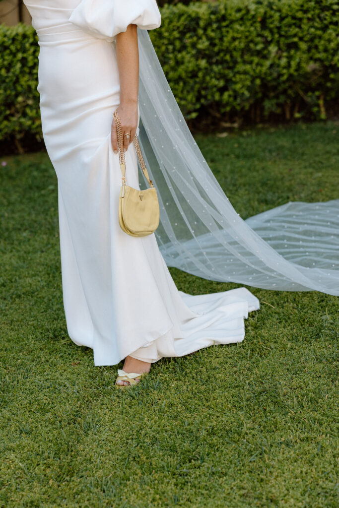 Tuscan-inspired Château St. Jean wedding venue in Sonoma Valley with arched windows, manicured gardens, and rolling vineyard views during a European-inspired California wedding.