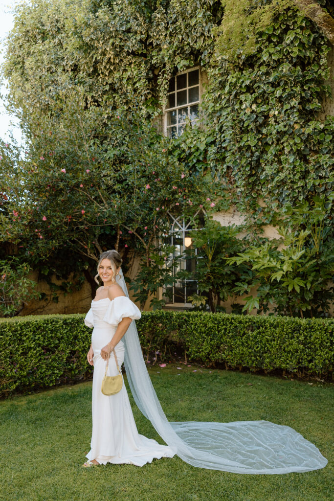 Tuscan-inspired Château St. Jean wedding venue in Sonoma Valley with arched windows, manicured gardens, and rolling vineyard views during a European-inspired California wedding.