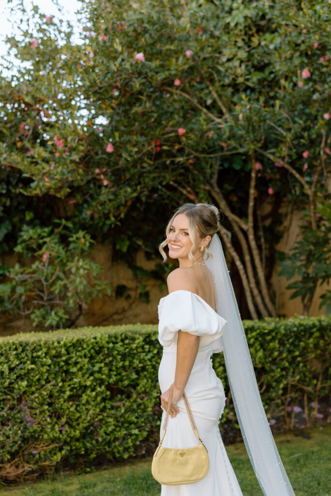 Tuscan-inspired Château St. Jean wedding venue in Sonoma Valley with arched windows, manicured gardens, and rolling vineyard views during a European-inspired California wedding.