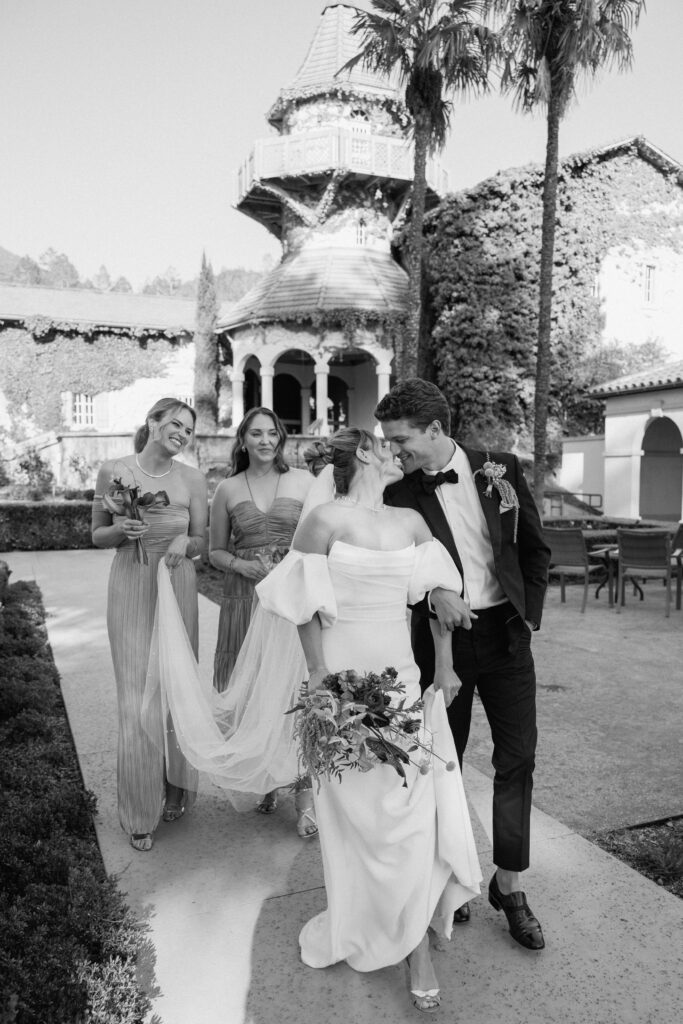 Tuscan-inspired Château St. Jean wedding venue in Sonoma Valley with arched windows, manicured gardens, and rolling vineyard views during a European-inspired California wedding.
