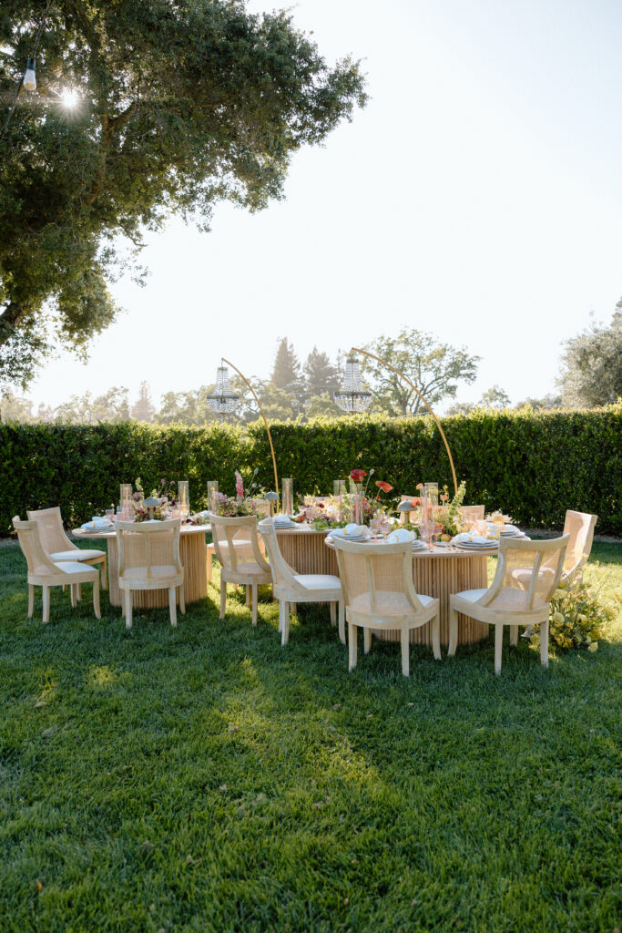 Editorial wedding reception at Château St. Jean with crystal chandeliers, calla lily place cards, and a wood-and-white checkered dance floor in Sonoma Valley.
