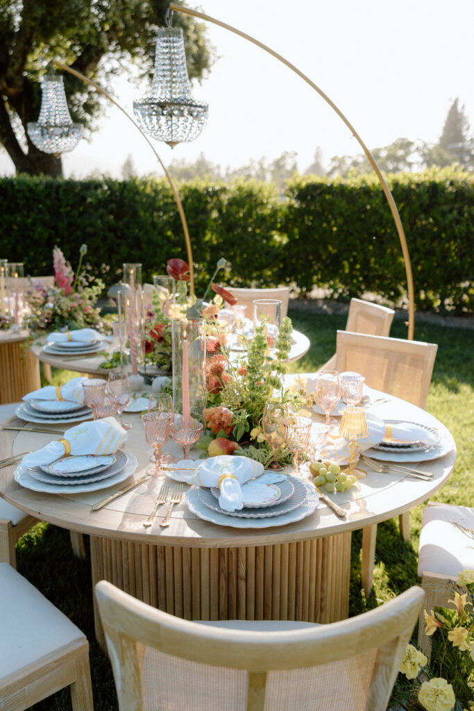 Editorial wedding reception at Château St. Jean with crystal chandeliers, calla lily place cards, and a wood-and-white checkered dance floor in Sonoma Valley.
