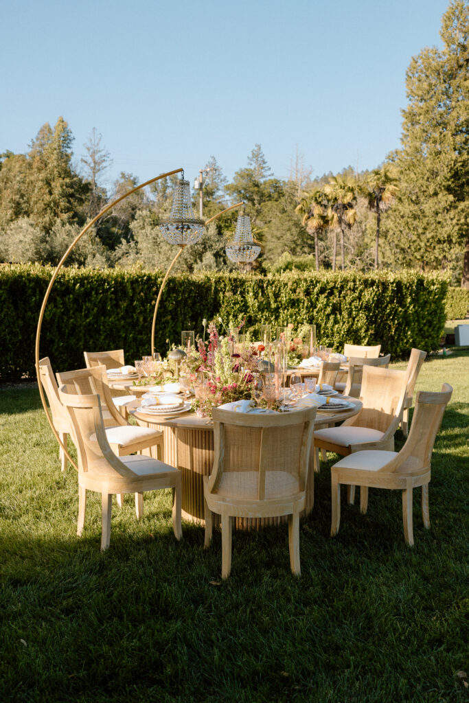 Editorial wedding reception at Château St. Jean with crystal chandeliers, calla lily place cards, and a wood-and-white checkered dance floor in Sonoma Valley.