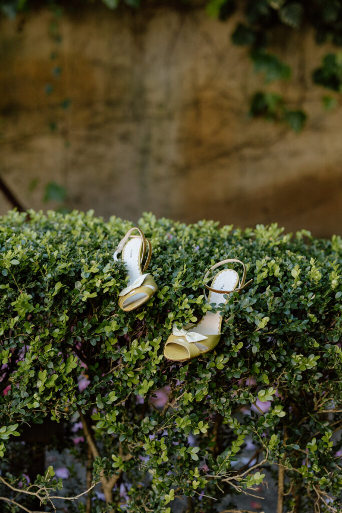 European-inspired wedding stationery and fashion details at Château St. Jean, featuring custom paper goods, vintage designer accessories, and elevated bridal styling in Sonoma Valley.