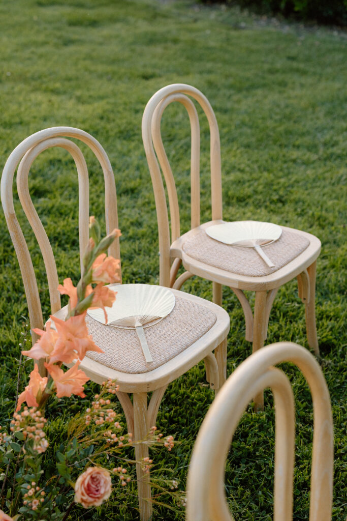 Romantic outdoor wedding ceremony at Château St. Jean with flowing florals, arched architecture, and vineyard backdrops inspired by European destination weddings.
