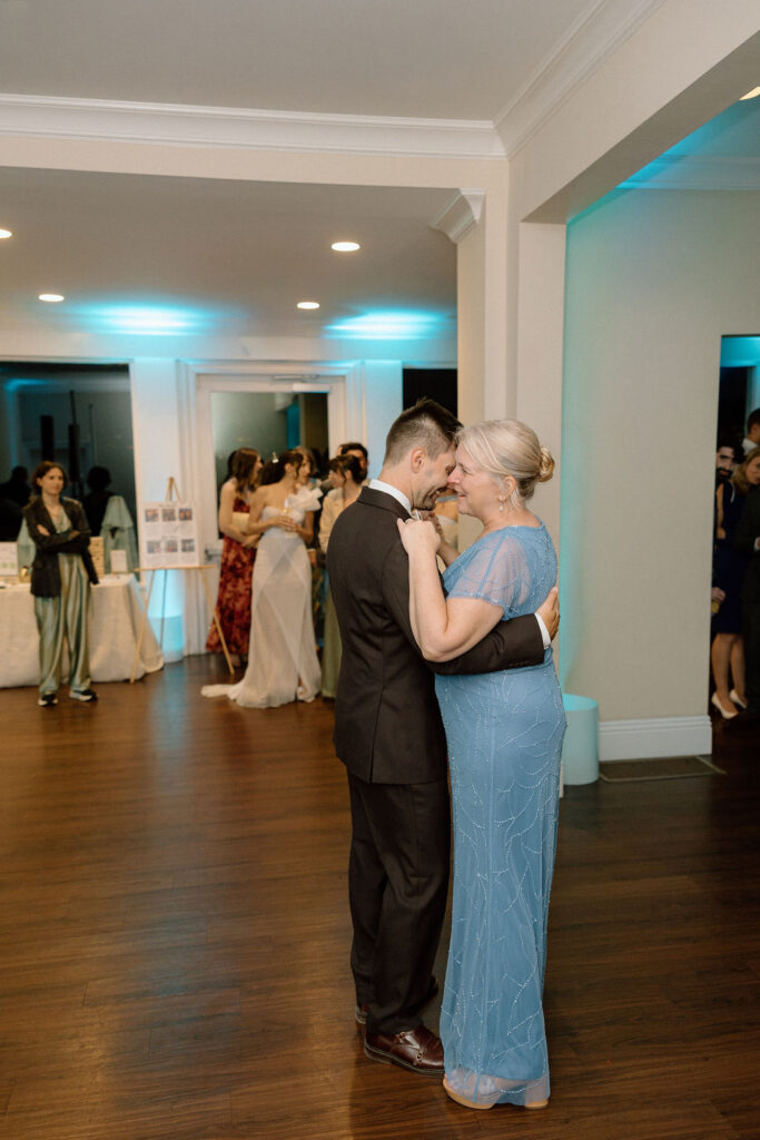 Joyful dance floor moments at a Northern California waterfront wedding reception