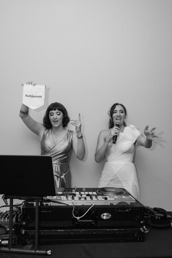 Bride performing a surprise song during the reception at her Northern California sailboat wedding