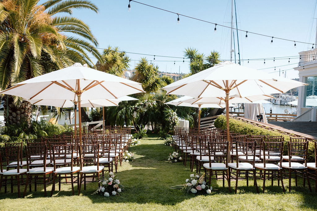 Tropical-inspired wedding florals with bold blooms and sea-green tones at a coastal Northern California wedding