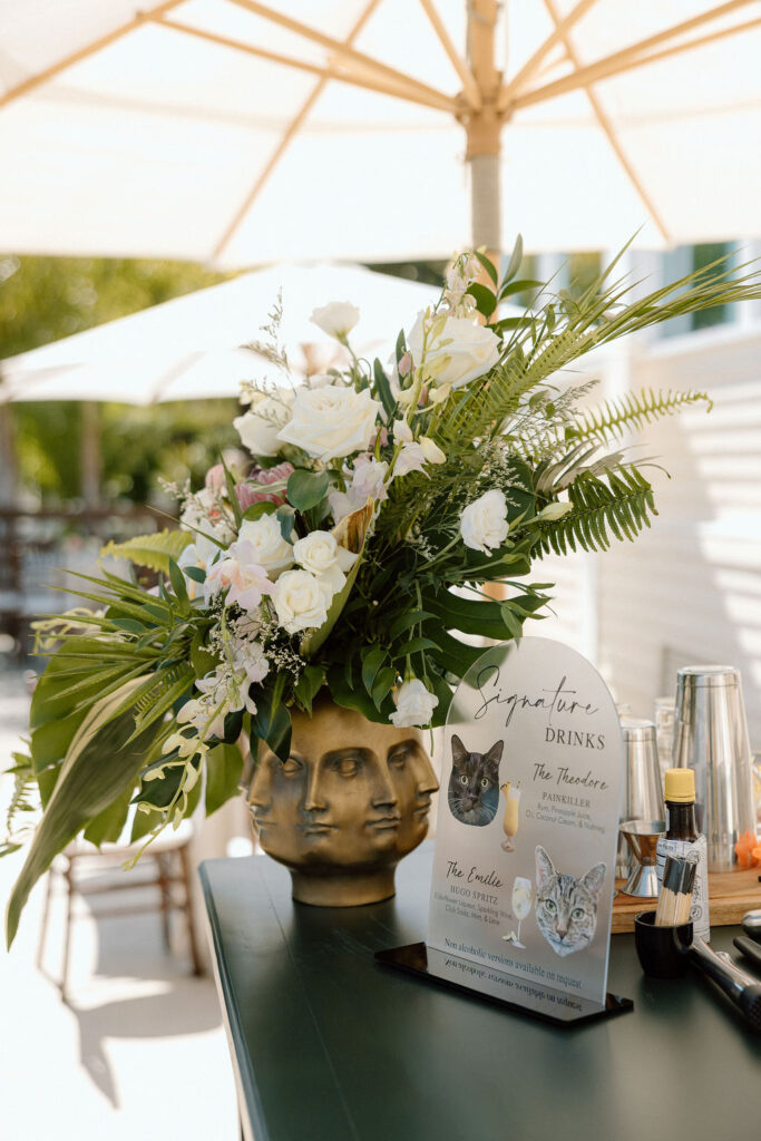 Thoughtfully designed cocktail hour setup with nautical-inspired details at a Northern California waterfront wedding