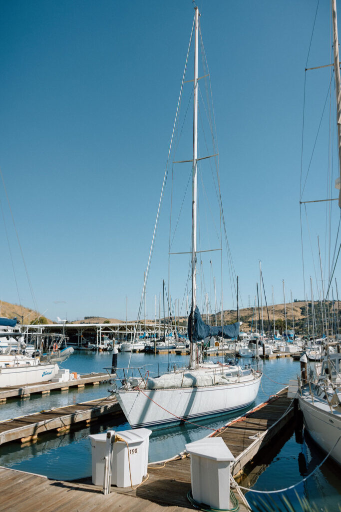 Thoughtfully designed cocktail hour setup with nautical-inspired details at a Northern California waterfront wedding