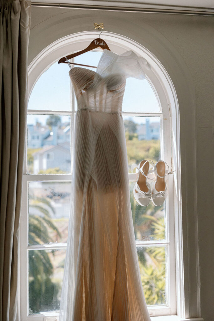 Bride in an elegant wedding dress captured in natural coastal light at a Glen Cove Marina wedding