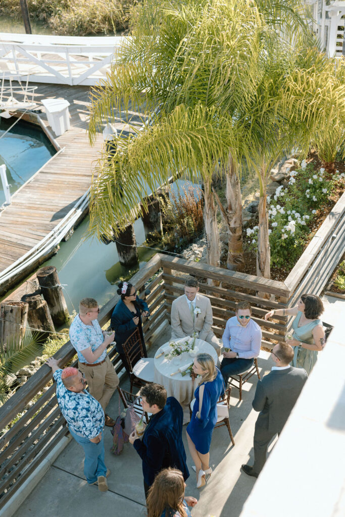Thoughtfully designed cocktail hour setup with nautical-inspired details at a Northern California waterfront wedding