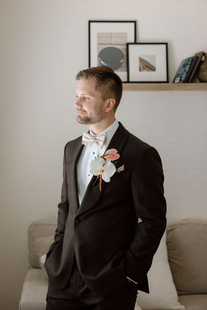 Groom preparing for his wedding day before the ceremony at a San Francisco Bay sailboat wedding