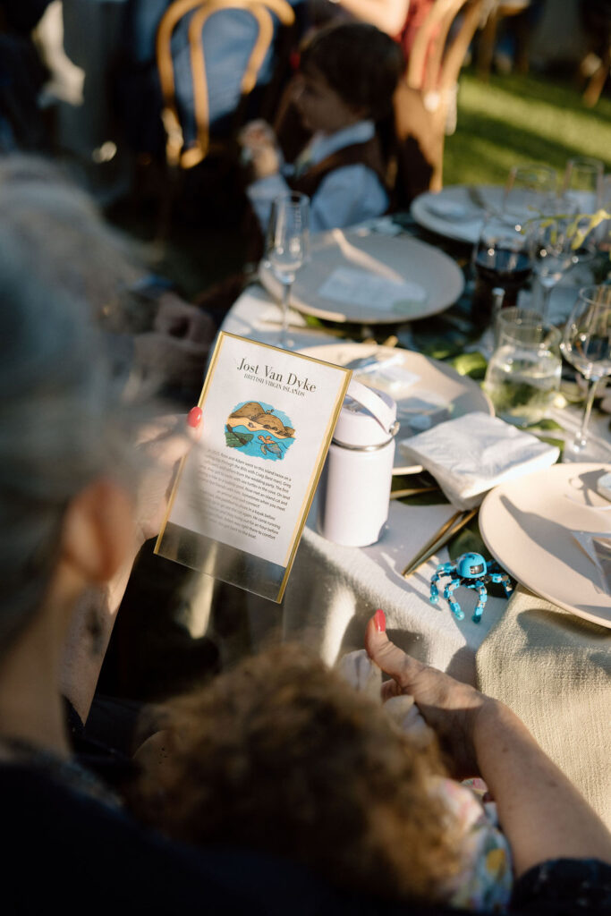 Golden hour reception beneath palm trees at a Northern California waterfront wedding