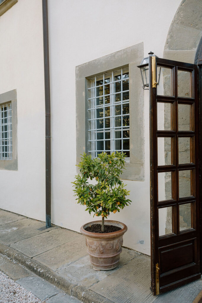 Luxury Renaissance villa in Tuscany with terracotta roofs, olive groves, and panoramic countryside views at Hotel Villa di Piazzano.