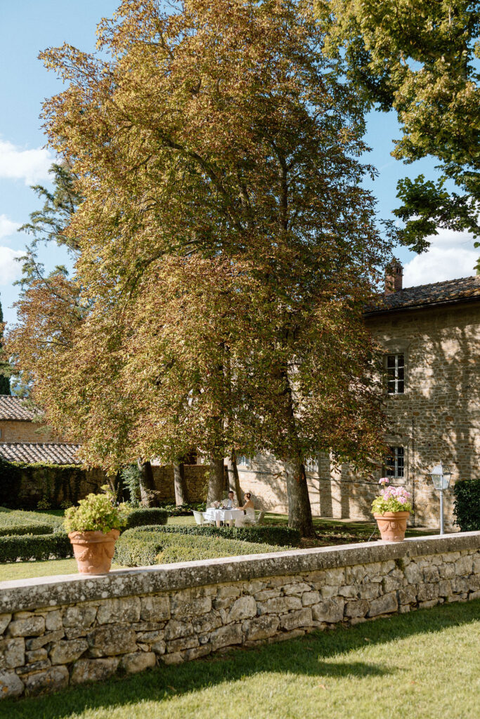 Luxury Renaissance villa in Tuscany with terracotta roofs, olive groves, and panoramic countryside views at Hotel Villa di Piazzano.