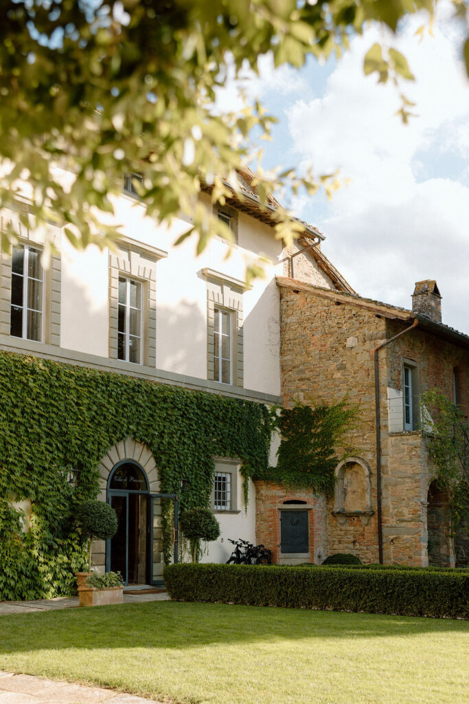 Luxury Renaissance villa in Tuscany with terracotta roofs, olive groves, and panoramic countryside views at Hotel Villa di Piazzano.