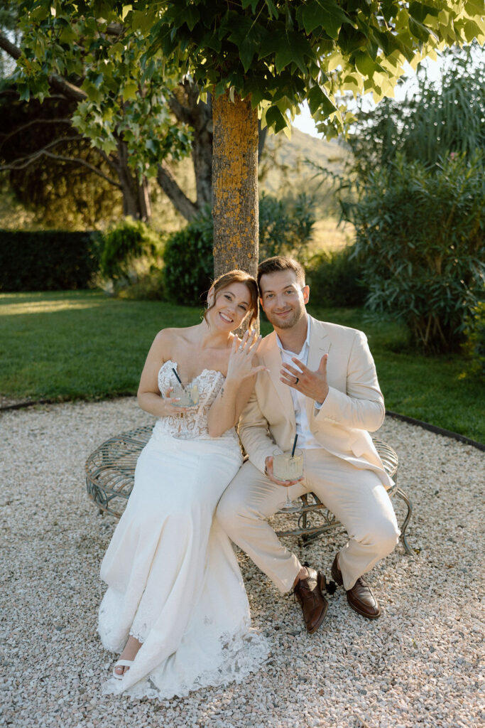 Private wine and hors d’oeuvres celebration in a secluded garden patio at Villa di Piazzano during a destination wedding weekend.
