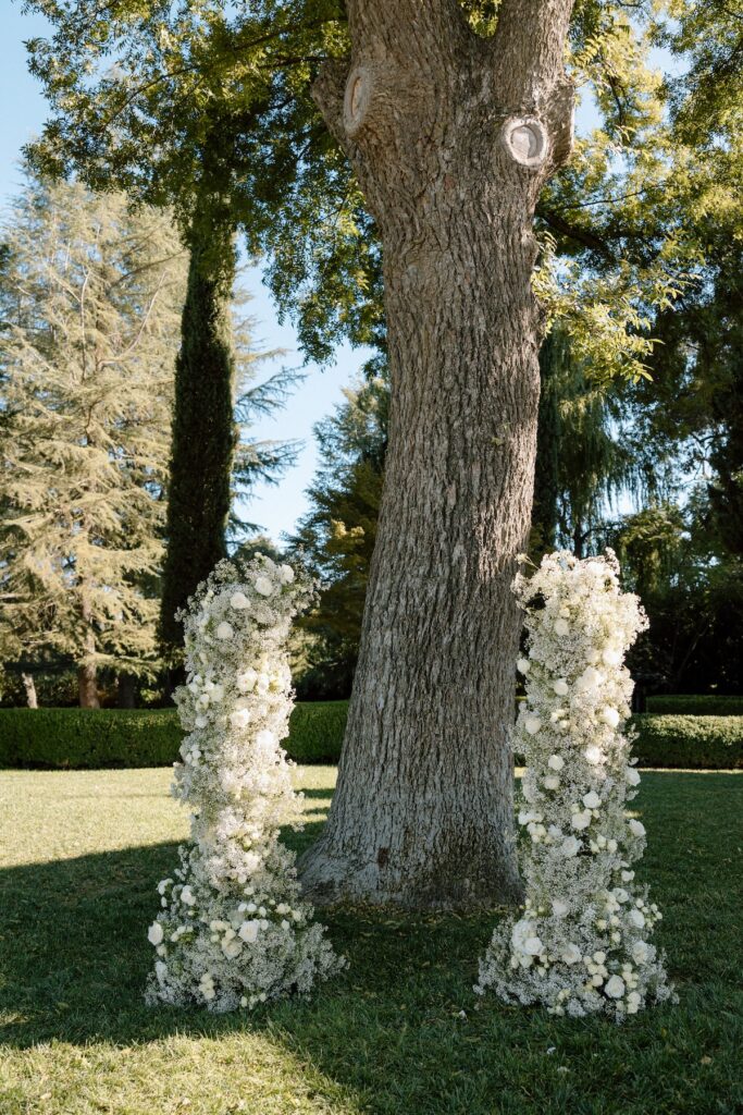 beautifully designed ceremony floral arch at park winters captured by california wedding photographer