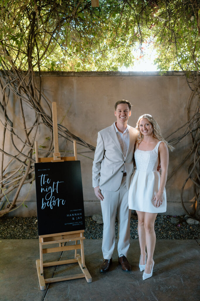 bride and groom pose during their rehearsal dinner during their wedding weekend in Northern California captured by Katelyn Bradley Photography