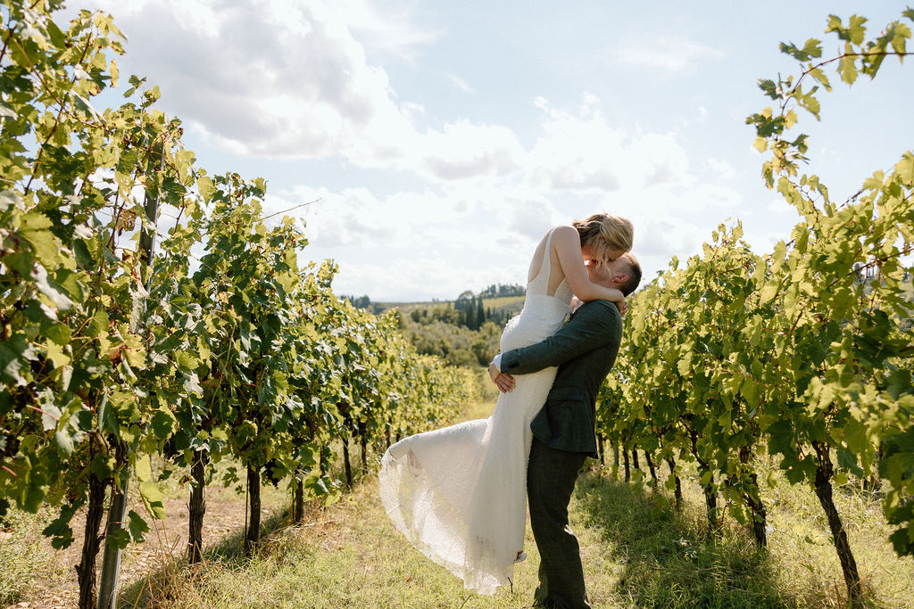 A joyous couple from the United States Elope in the hills and vineyards of Tuscany at COMO Castello Del Nero. 