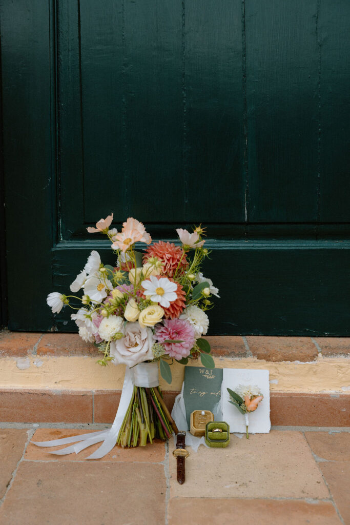 Flat lay and bouquet of details designed by Piper designs for Tuscany Wedding