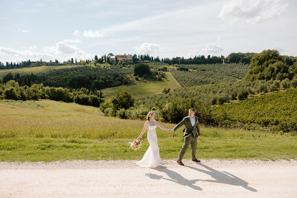 Joyous couple from the United States Elope in the hills of Tuscany at COMO Castello Del Nero.